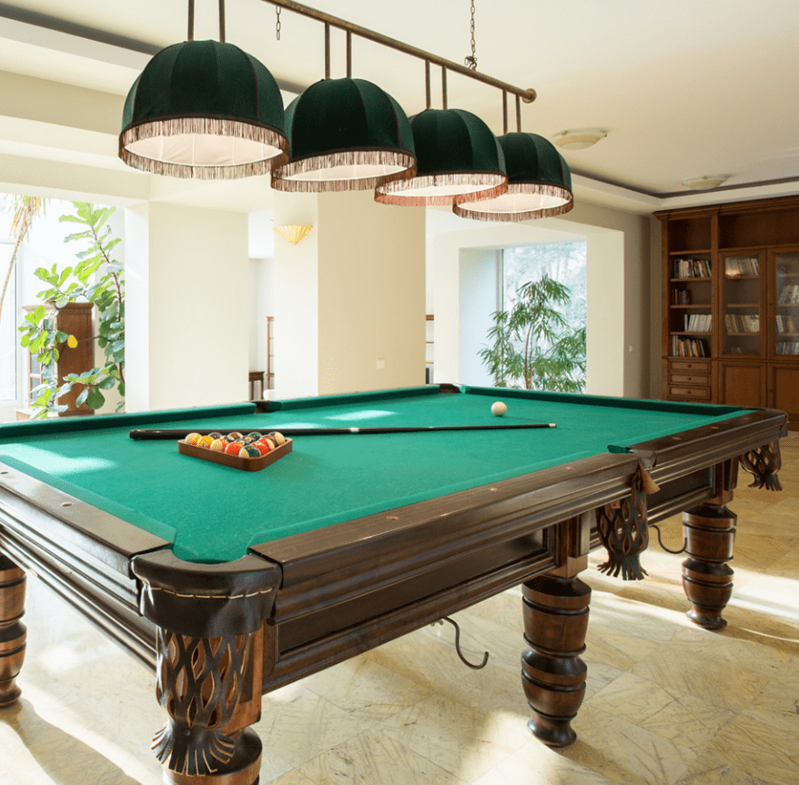 Team moving a grand piano